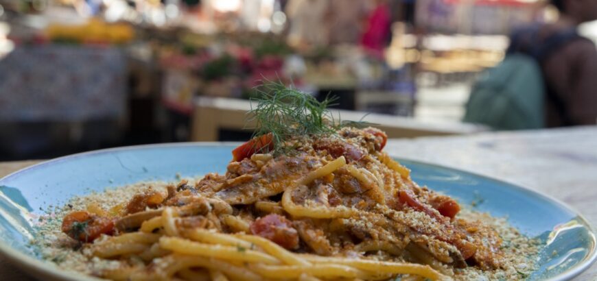 Fish-based dish served by Fishiaria, a restaurant located in the fish market of Catania